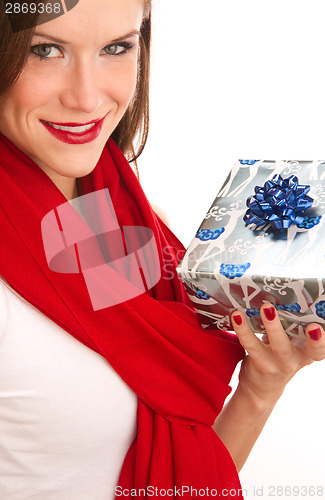 Image of the gift offered by beautiful brunette in red scarf