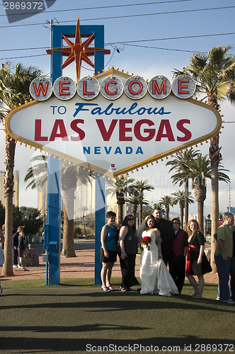 Image of Couple Gets Married Wedding Under Welcome to Las Vegas Sign