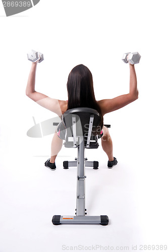 Image of Woman on Weight Bench During Work Out