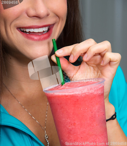 Image of Happy Girl with Red Watermelon Smoothie