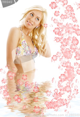 Image of bikini blond #3 in water with flowers