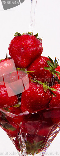 Image of Water Flowing Through Fresh Strawberries in Parfait Glass