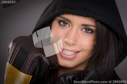 Image of Beautiful Boxer Female in Black Hoodie Wearing Practice Gloves 