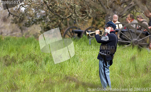 Image of Civil War Reenactment Union Soldier Buglar Sounds Call During Ba