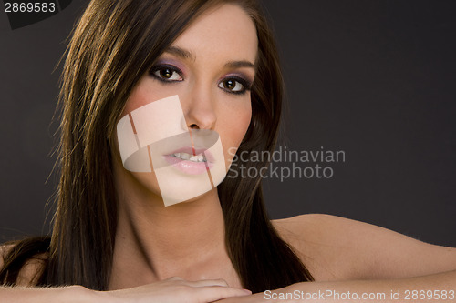 Image of Attractive Young Woman in Head and Shoulders Pose