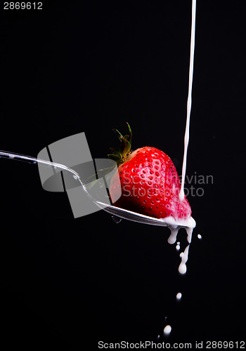Image of Raw Food Fruit Strawberry Milk Splash on Spoon