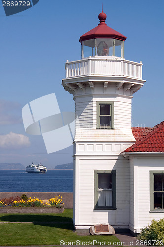 Image of West Coast Lighthouse & Ferry Arriving Puget Sound Washington St