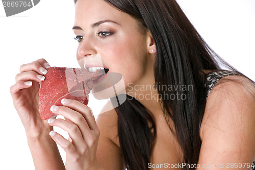 Image of Woman Eating Raw Meat Gnawing Bite with Teeth