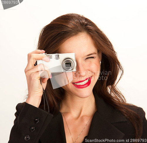 Image of Stunning Brunette Photographs the Viewer in Square Composition