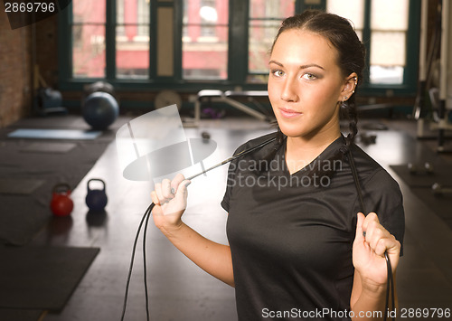 Image of Healthy Fit Woman Stands after Rope Work at Fitness Boot Camp