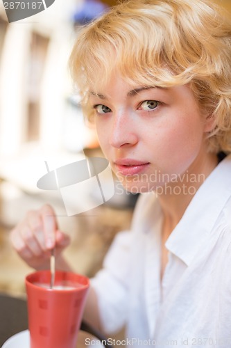 Image of Lady With Cup of Coffee.