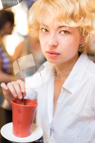 Image of Lady With Cup of Coffee.