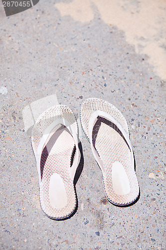 Image of Pair of rubber sandals