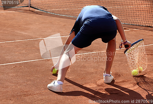 Image of A ball boy in action