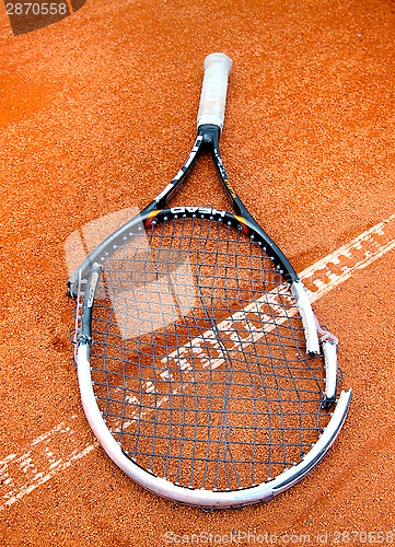 Image of Broken Tennis Racket 