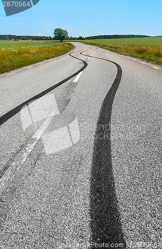 Image of 	Tire print on the asphalt road