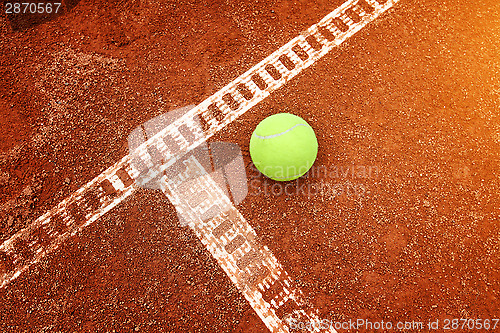 Image of Yellow ball on the court ground