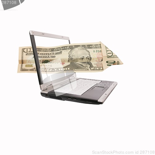 Image of laptop and a flying dollar