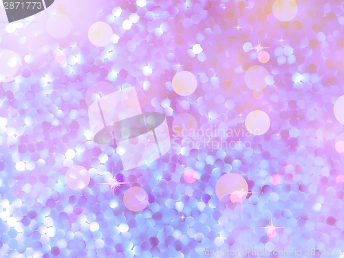 Image of Glitters on a soft blurred background. EPS 10