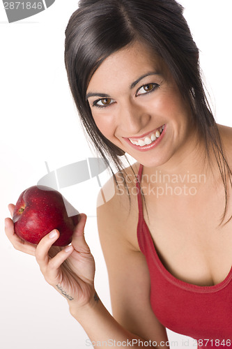Image of An Apple a Day Woman Smiles Holding Fresh Fruit