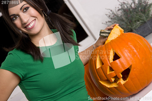 Image of Happy Beautiful House Wife Pumkin Carver With Jack-o-Lantern