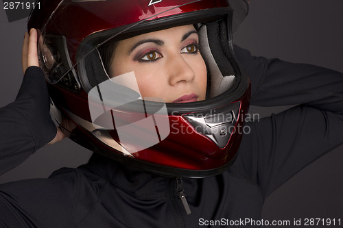 Image of Adorable Female Wearing Red Full Face Racing Helmet