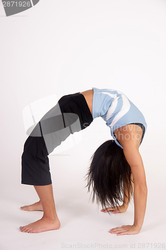 Image of Beautiful Young Brunette Woman Practicing Yoga Meditation Pose