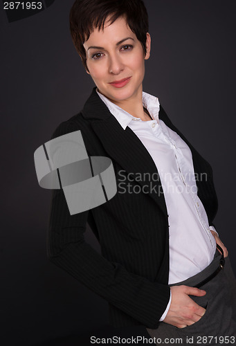 Image of Serious Brunette Woman Draws Attention Business Female Office Po