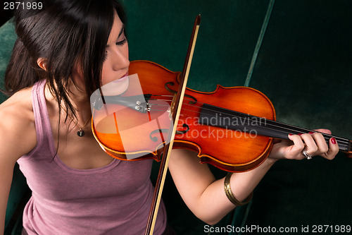 Image of Sensual Attractive Brunette Woman Playing Concert Acoustic Strin