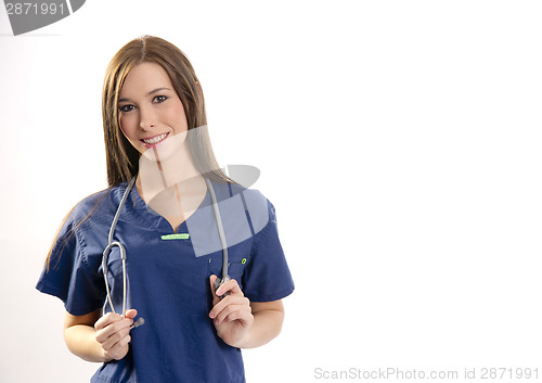 Image of Beautiful Brunette Nurse Holds Her Stethoscope Looking at Camera