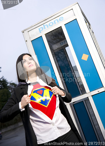 Image of Super Mom Superhero Leaves Phone Booth Ready for Crimefighter Ro