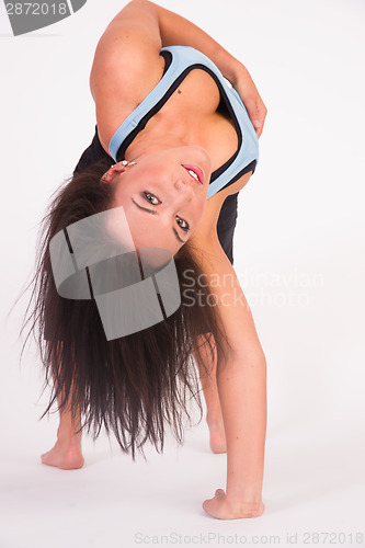 Image of Beautiful Flexible Acrobatic Woman Arched Backwards One Arm Stan