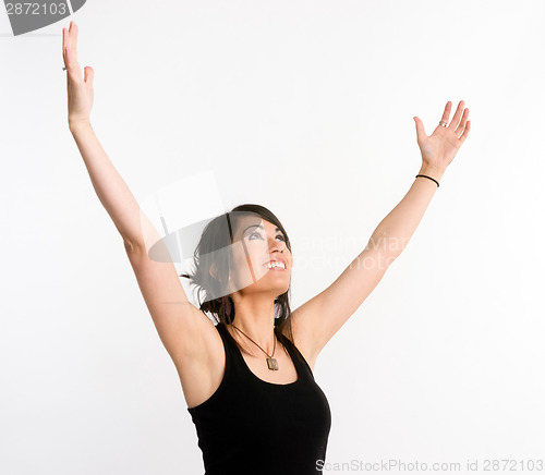Image of Pretty Brunette Woman Holds Arms Outstretched Jubilant Looking U