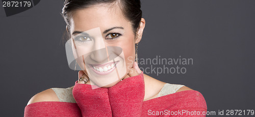 Image of Beautiful Woman Excited With Hands Clinched Under Chin Red Sweat