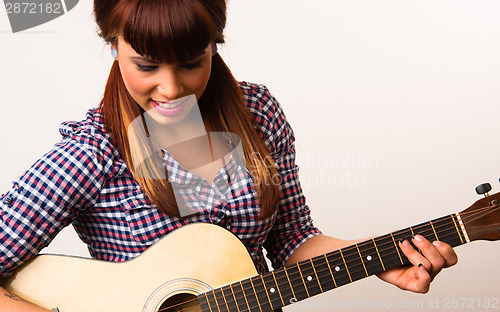 Image of Attractive Woman Torso Holding Playing Guitar Acoustic Musician