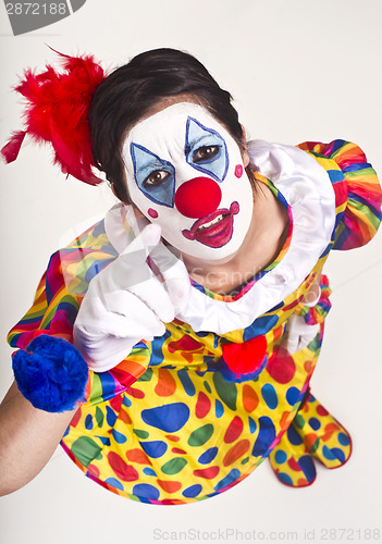 Image of Female Circus Clown Pointing up at Camera