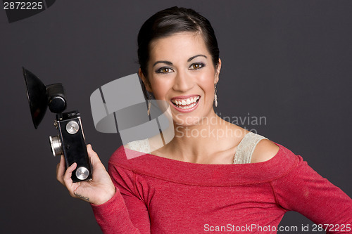Image of Woman with vintage camera