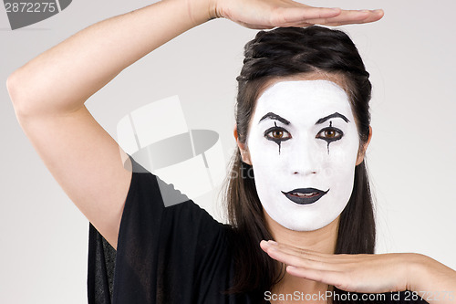 Image of Beautiful Brunette Woman Theatrical Performance Mime Dance White