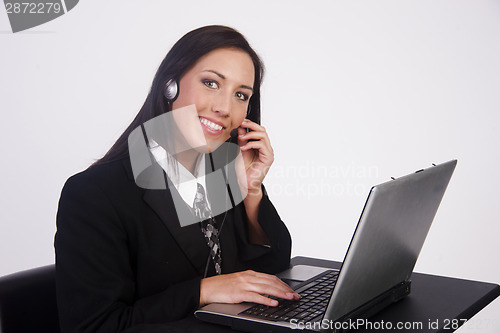 Image of Attractive Young Woman Works Customer Service Computer Headset