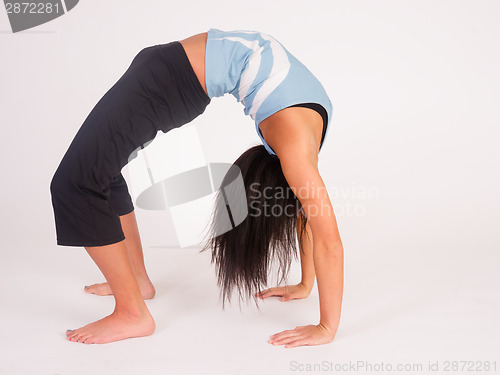 Image of Beautiful Flexible Acrobatic Woman Arched Backwards Two Arm Stan