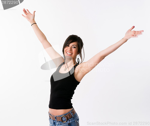 Image of Pretty Brunette Woman Holds Arms Outstretched Jubilant Looking U