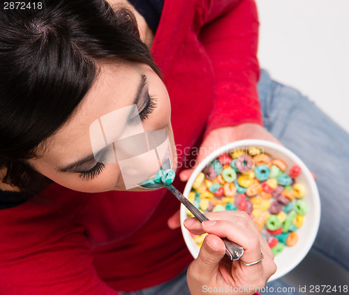 Image of Happy Attractive Woman Eats Bowl Colorful Breakfast Cereal