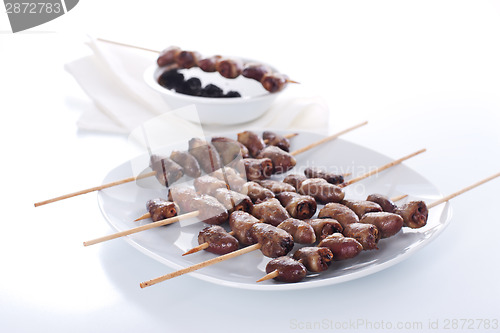 Image of Grilled chicken hearts on skewers