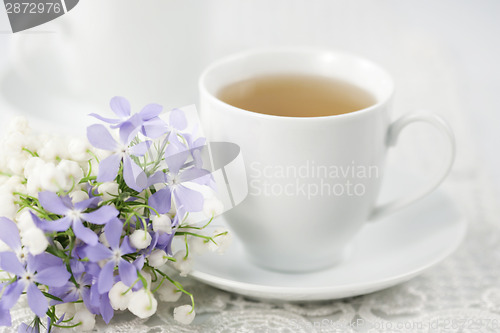 Image of Cup of tea and flowers 