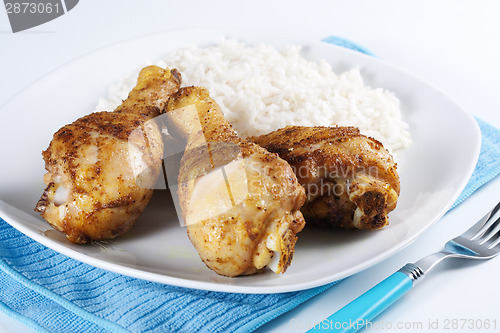 Image of Roasted chicken legs with boiled rice