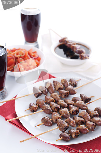 Image of Grilled chicken hearts on skewers