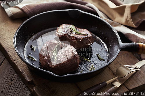 Image of Beef steak in pan