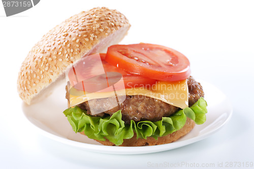 Image of Cheeseburger with tomatoes and lettuce