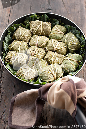 Image of Dolmades with rhubarb leaves, meat and rice 