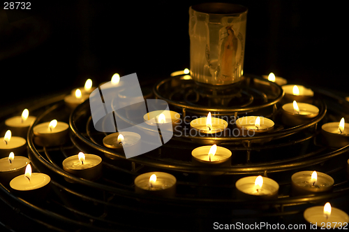 Image of Candles lit as a prayer, Notre dame, cathedral, paris, france